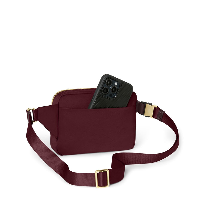 Wine TUMI waist bag with rear phone pocket