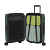 Green Samsonite suitcase with open compartment showing green and gray packing cubes.