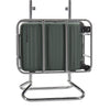 Green Samsonite suitcase on a metal stand against a white background