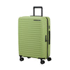 Green Samsonite suitcase with a black handle on a white background