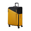 front of black/yellow American Tourister Daring Dash spinner large expandable
