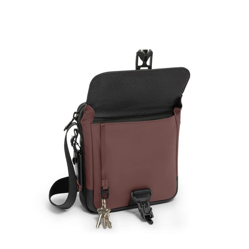 front pocket of oxblood TUMI Bravo Junior Crossbody