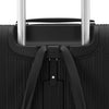 Black Samsonite suitcase with handle and shoulder strap on a white background