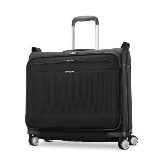 Black Samsonite suitcase with wheels and handle on a white background