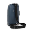 Blue TUMI backpack with a black strap on a white background