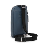 Blue TUMI backpack with a black strap on a white background