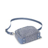 bottom of denim blue TUMI Voyageur Teghan Crossbody