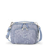 front of denim blue TUMI Voyageur Teghan Crossbody