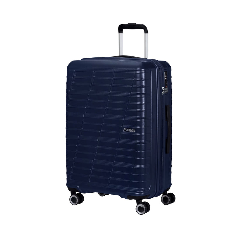front of metallic blue American Tourister Surftime Spinner Carry-On