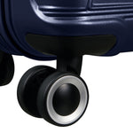 wheels of metallic blue American Tourister Surftime Spinner Carry-On