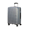 front of silver American Tourister Surftime Spinner Carry-On