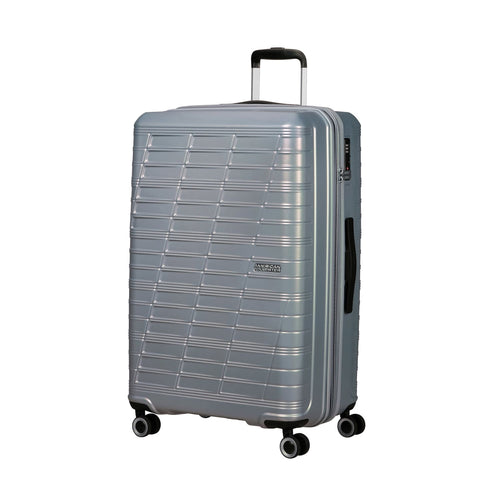 front of silver American Tourister Surftime Spinner Large Expandable