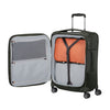 Climbing Ivy Samsonite suitcase with open lid showing an orange bag inside on a white background