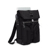 Black TUMI backpack with laptop compartment on a white background