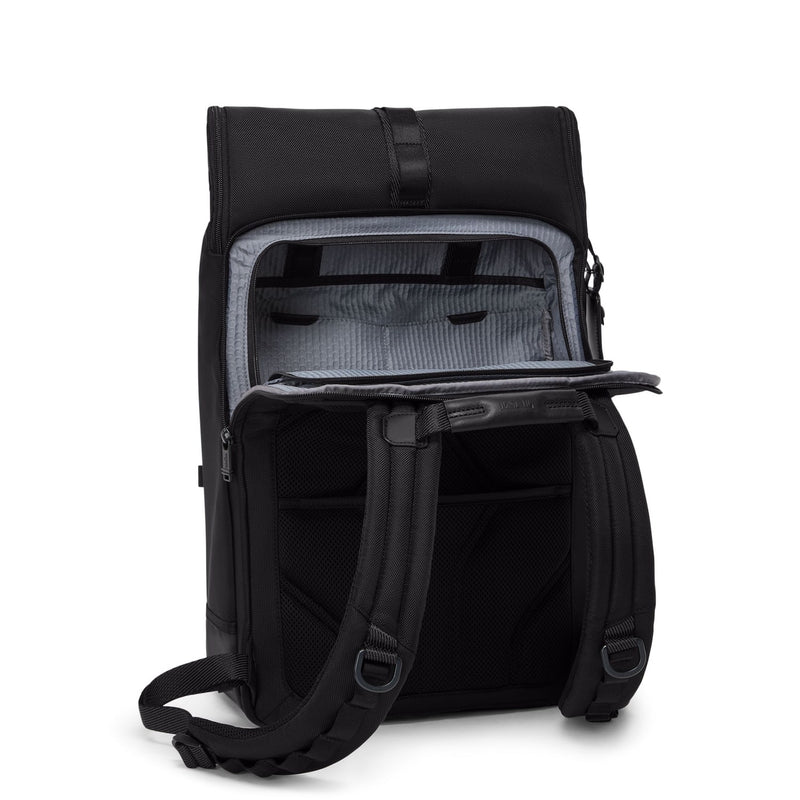 Black TUMI backpack with open compartment on a white background
