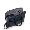 Blue TUMI bag with open compartment on a white background