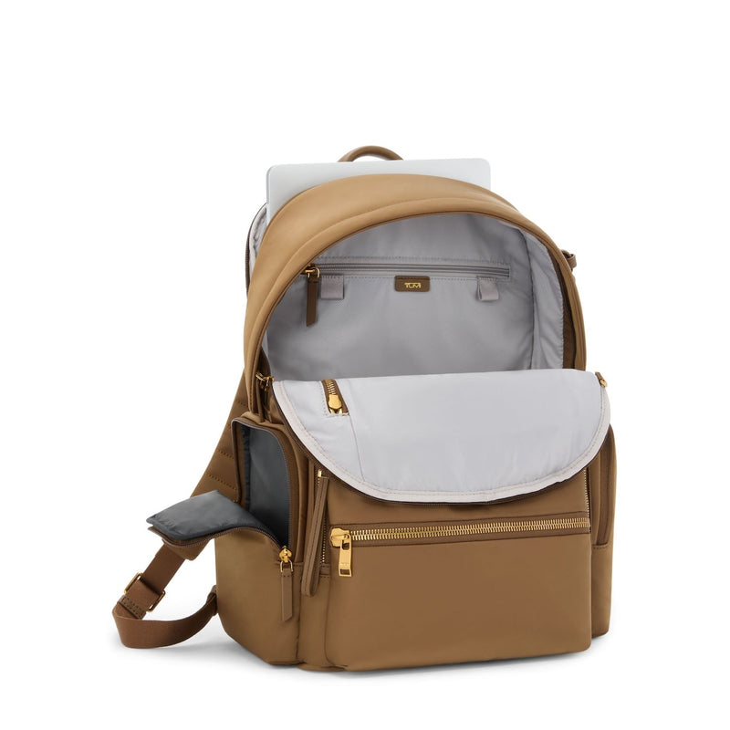 Copper TUMI backpack with open front compartment on a white background