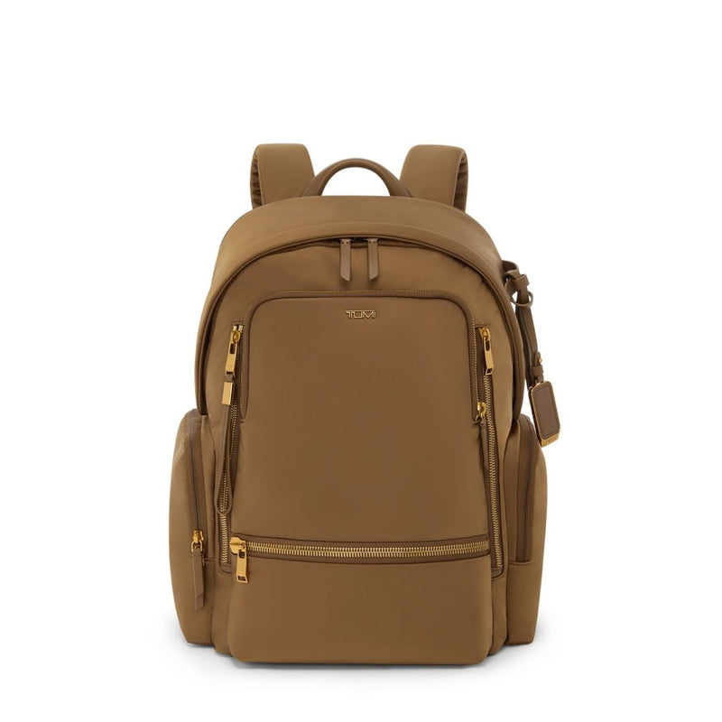 Copper TUMI backpack with gold zippers on a white background