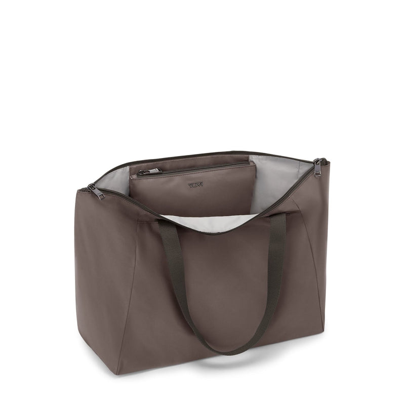 Mink TUMI tote bag with a visible brand logo on a white background