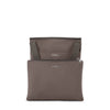 Mink TUMI bag with a visible brand logo on a white background