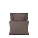 Mink TUMI bag with a visible brand logo on a white background