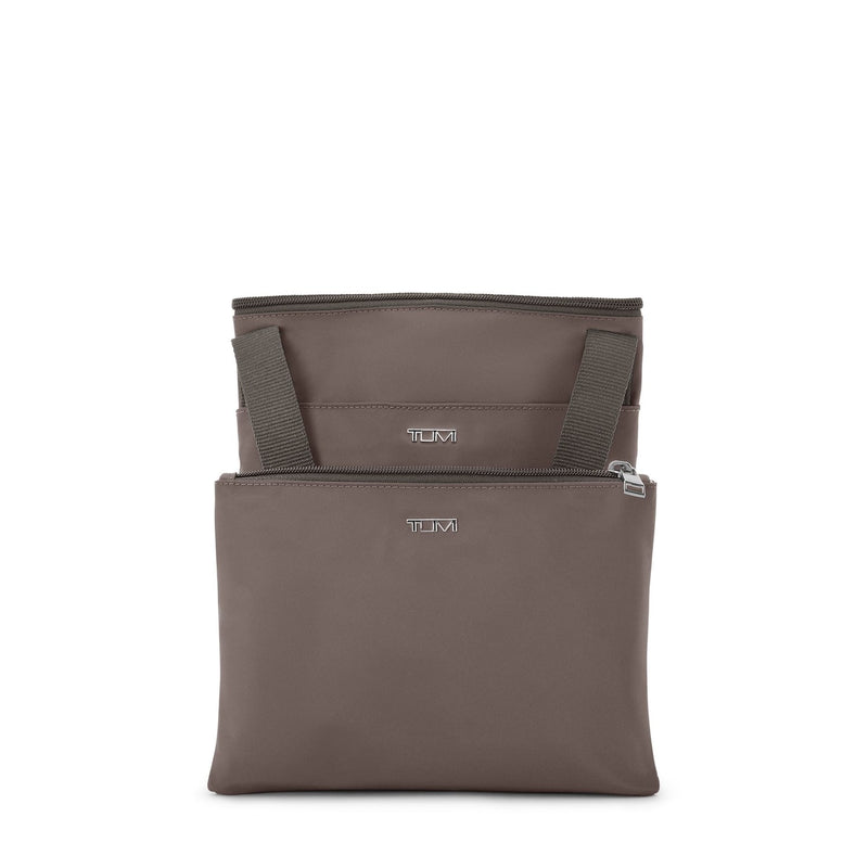 Mink TUMI bag with a visible brand logo on a white background