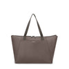 Mink TUMI tote bag with a visible brand logo on a white background