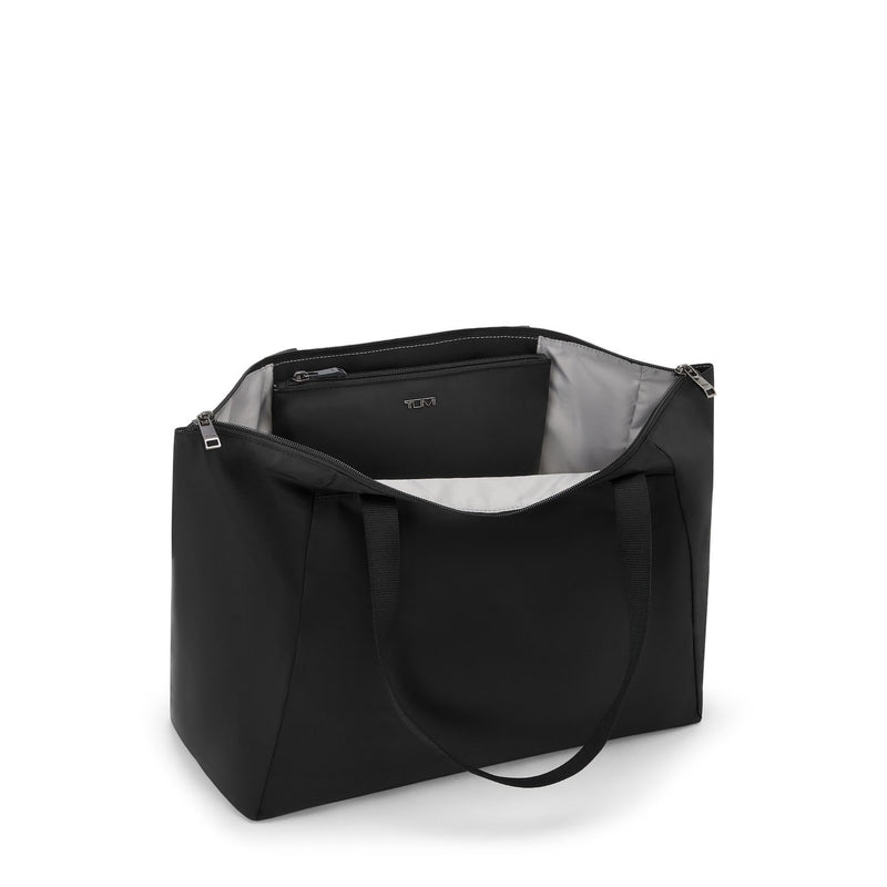 Black TUMI tote bag on a white background