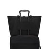 Black TUMI tote on a white background