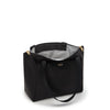 Black TUMI tote bag with gold accents on a white background