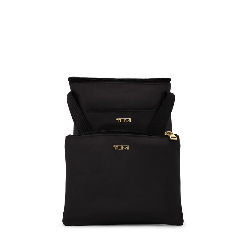 black TUMI pouch with gold zippers on a white background