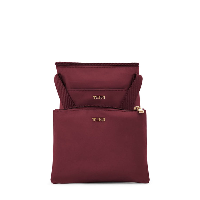 Wine TUMI bags with gold logo on a white background