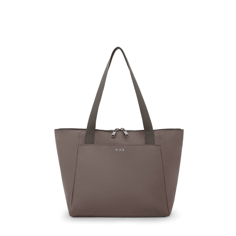 Mink TUMI tote bag with a visible brand logo on a white background
