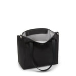 Black TUMI tote bag on a white background