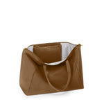 Copper TUMI tote bag with a white interior on a white background