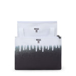 Black and white TUMI pouch with a gradient design and logo on a white background