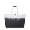 Black and white TUMI tote bag with a gradient design on a white background
