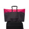 Black and pink TUMI tote bag on a white background