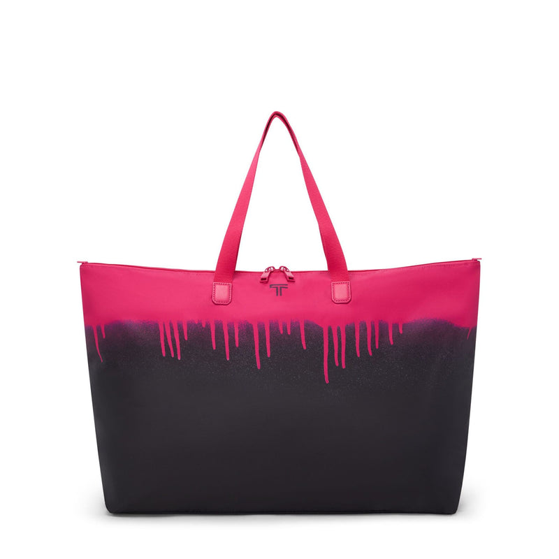 TUMI Tote bag with pink and black design on a white background