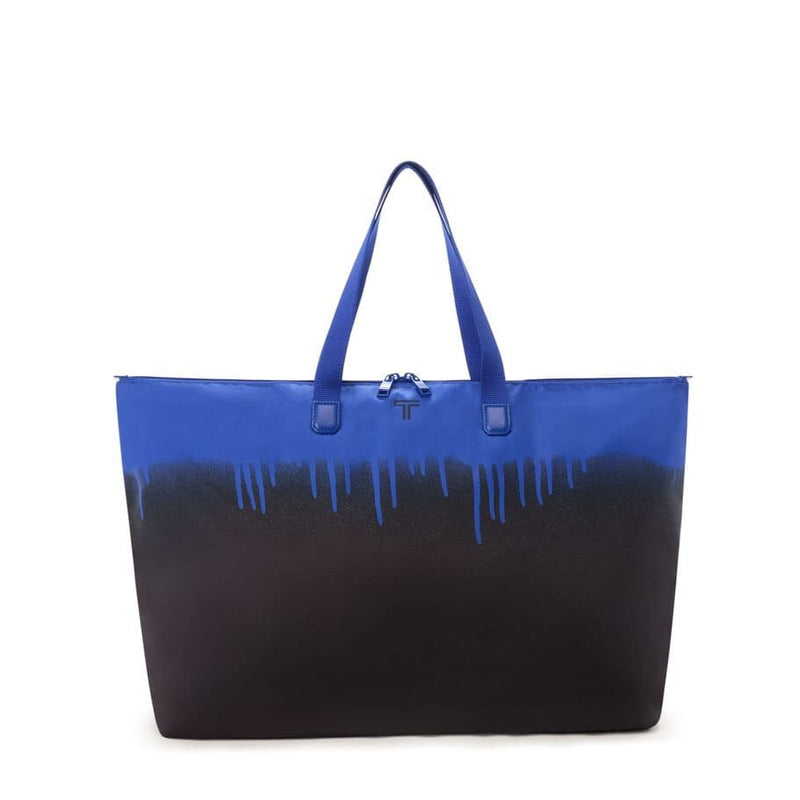 Blue and black TUMI tote bag with gradient design on a white background