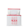 White bag with red zipper and 'TUMi' text on a white background