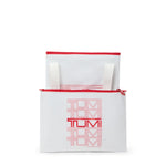 White bag with red zipper and 'TUMi' text on a white background
