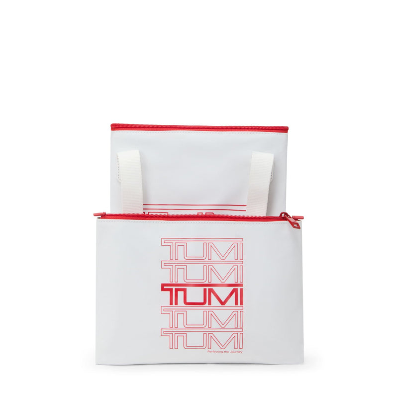 White bag with red zipper and 'TUMi' text on a white background