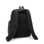 Black TUMI backpack with multiple compartments on a white background