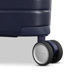 wheels of navy Samsonite Virtuosa Spinner Carry-On