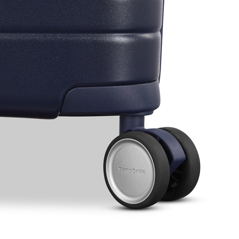 wheels of navy Samsonite Virtuosa Spinner Carry-On