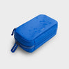 Blue orbitkey rectangular case with a zipper on a light gray background