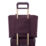pass-through sleeve of plum Briggs & Riley Baseline Traveler Tote