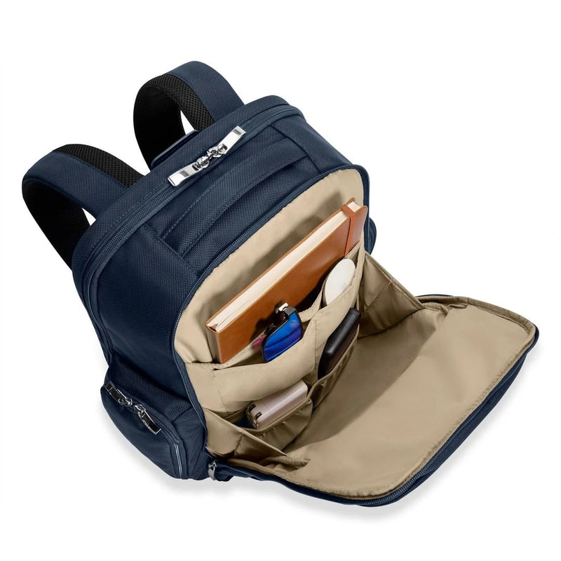 Front pocket of navy Briggs & Riley Baseline Traveler Backpack