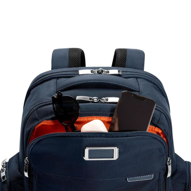 Front pocket of navy Briggs & Riley Baseline Traveler Backpack